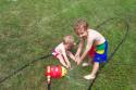 20050818 Andrew and Matthew playing with sprinkler 04